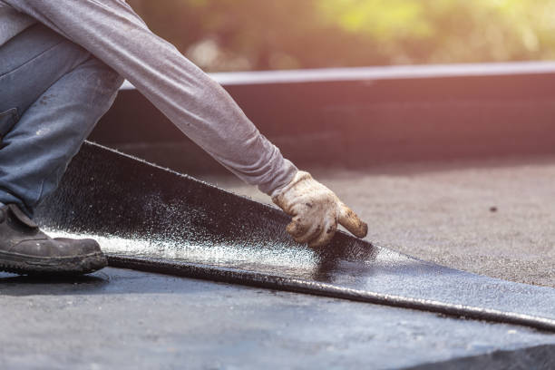 Professional Waterproofing technician working in Economy, IN